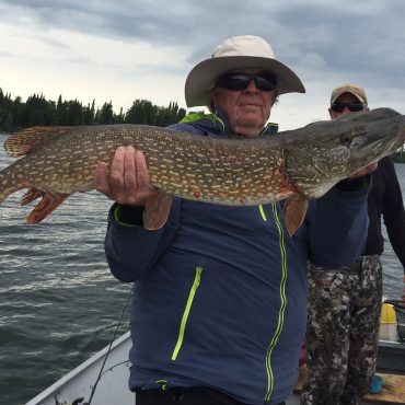 Guest with his Northern Pike Catch