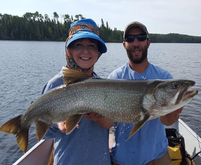 Women with Huge Lake Trout Catch